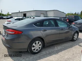 2017 Ford Fusion SE z VIN 3FA6P0H74HR390898, wystawiony jako Copart lot #58958275 z przebiegiem 159 799 mil mil oraz Szkoda całkowita • Salvage title. Historia ofert i sprzedaży dostępna na DreamBid. Obrazek 3.