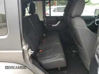 2016 Jeep Wrangler Unlimited Sahara with VIN 1C4BJWEGXGL264740, listed as a Copart auction lot 57225115 with 183,647 mi miles and Salvage title. Bid and sale history available at DreamBid. Image 11.