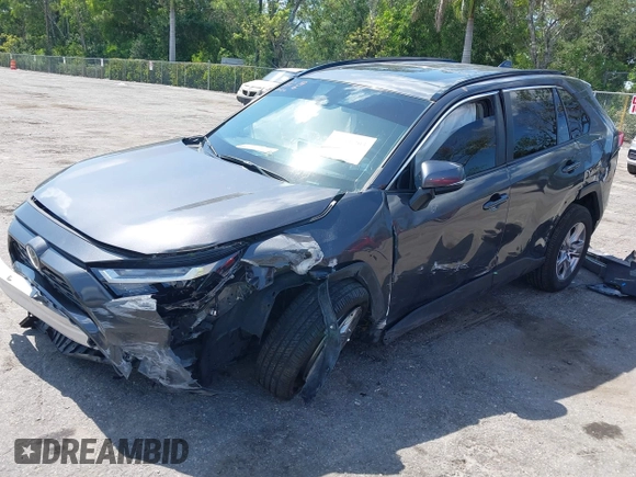 2022 Toyota RAV4 XLE with VIN 2T3W1RFV5NW202544, listed as a IAAI auction lot 42295293 with 60,759 mi miles and . Bid and sale history available at DreamBid. Image 2.