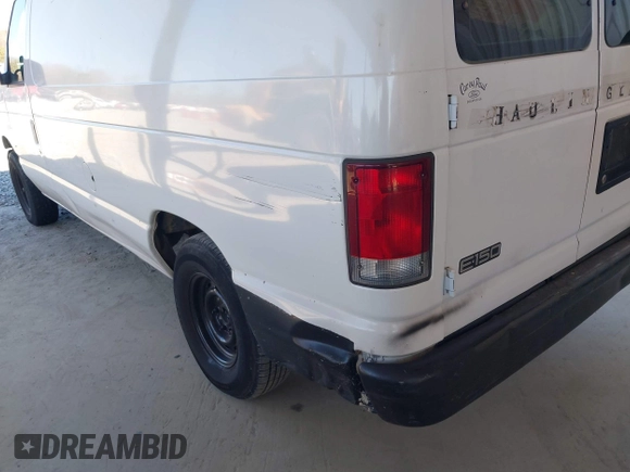 1999 Ford Econoline Cargo with VIN 1FTRE1429XHC29847, listed as a IAAI auction lot 41680406 with 262,002 mi miles. Bid and sale history available at carsss.com. Image 6.