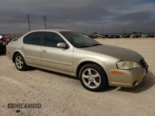 2001 Nissan Maxima SE z VIN JN1CA31D81T606081, wystawiony jako Copart lot #82989204 z przebiegiem 181 732 mil mil oraz Tytuł czysty. Historia ofert i sprzedaży dostępna na DreamBid. Obrazek 4.