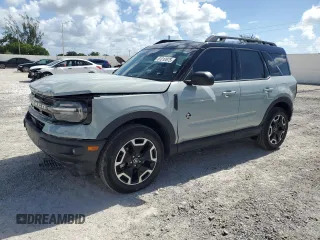 2023 Ford Bronco Sport Outer Banks with VIN 3FMCR9C65PRD14403, listed as a Copart auction lot 61212675 with 7,076 mi miles and Salvage title. Bid and sale history available at DreamBid. Image 1.