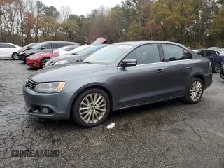 2012 Volkswagen Jetta Sedan SEL w/Sunroof with VIN 3VWLX7AJ7CM389484, listed as a Copart auction lot 83857594 with 212,348 mi miles and Salvage Title. Bid and sale history available at carsss.com. Image 1.
