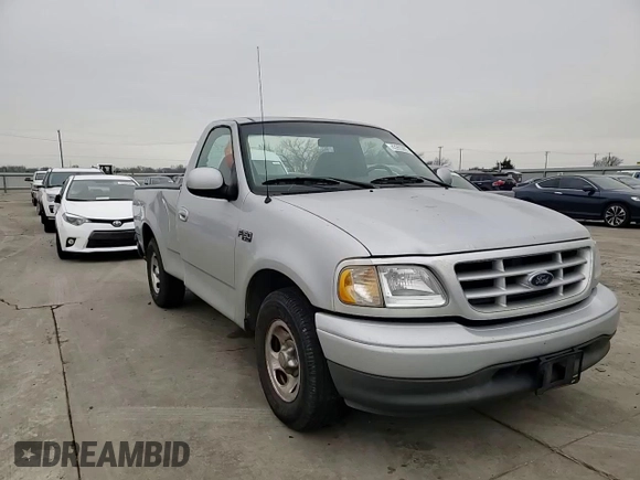2002 Ford F-150 XL with VIN 1FTRF172X2NB77521, listed as a Copart auction lot 43993885 with 339,289 mi miles and Salvage Title. Bid and sale history available at carsss.com. Image 11.