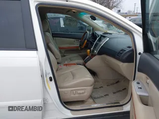 2007 Lexus RX 400h with VIN JTJGW31U572004833, listed as a IAAI auction lot 41938575 with 221,084 mi miles and . Bid and sale history available at DreamBid. Image 5.