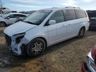2005 Honda Odyssey EX-L with VIN 5FNRL38695B406179, listed as a Copart auction lot 47470555 with 133,448 mi miles and Salvage Title. Bid and sale history available at carsss.com. Image 1.