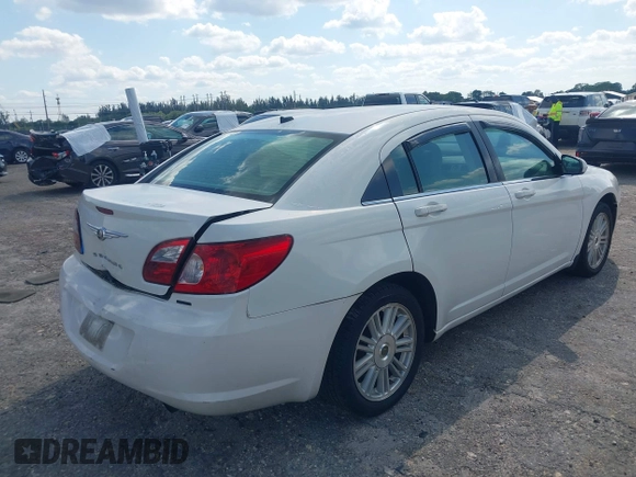 2007 Chrysler Sebring Touring with VIN 1C3LC56K37N533469, listed as a IAAI auction lot 42001566 with 187,698 mi miles and . Bid and sale history available at DreamBid. Image 4.