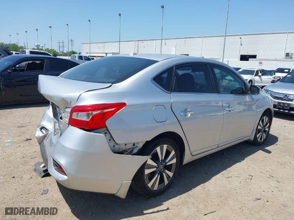 2019 Nissan Sentra S with VIN 3N1AB7AP2KY203809, listed as a IAAI auction lot 42026306 with 73,424 mi miles. Bid and sale history available at carsss.com. Image 4.