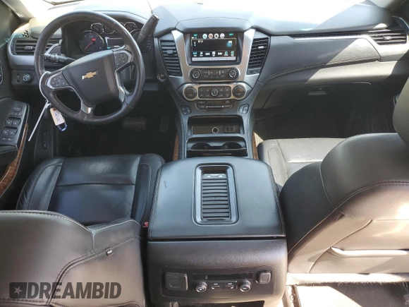 2018 Chevrolet Suburban Premier with VIN 1GNSCJKC1JR199271, listed as a Copart auction lot 52395935 with 216,083 mi miles and Salvage Title. Bid and sale history available at DreamBid. Image 8.