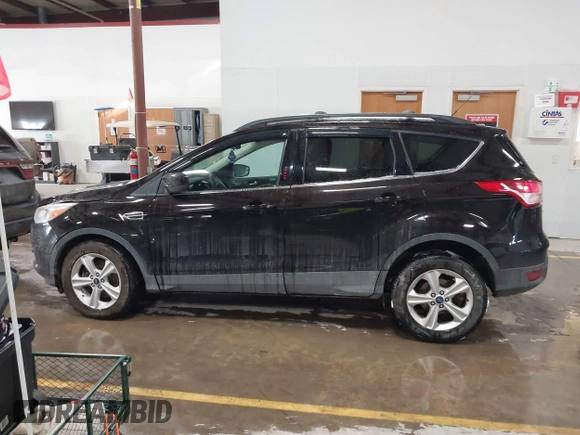2013 Ford Escape SE with VIN 1FMCU9GX6DUC07446, listed as a IAAI auction lot 41089866 with 119,018 mi miles. Bid and sale history available at carsss.com. Image 14.