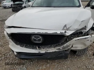 2021 Mazda CX-5 Grand Touring with VIN JM3KFBDM2M1436789, listed as a Copart auction lot 49534305 with 65,790 mi miles and Salvage Title. Bid and sale history available at carsss.com. Image 13.