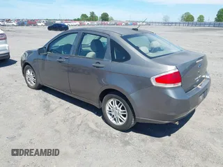 2009 Ford Focus SE with VIN 1FAHP35NX9W108176, listed as a IAAI auction lot 42094209 with 246,714 mi miles. Bid and sale history available at carsss.com. Image 3.