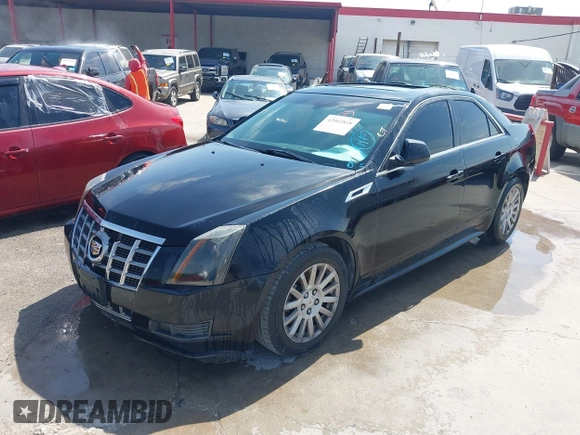 2012 Cadillac CTS Sedan Luxury with VIN 1G6DG5E58C0115323, listed as a IAAI auction lot 42002818 with 107,226 mi miles. Bid and sale history available at carsss.com. Image 2.