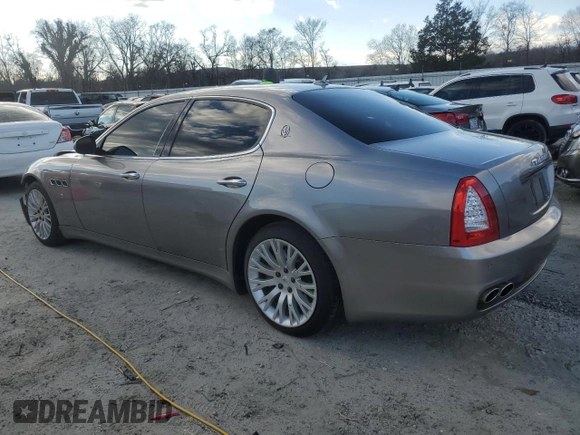 2009 Maserati Quattroporte z VIN ZAMFK39A690044644, wystawiony jako Copart lot #41343985 z przebiegiem 106 624 mil mil oraz Szkoda całkowita • Salvage title. Historia ofert i sprzedaży dostępna na DreamBid. Obrazek 2.
