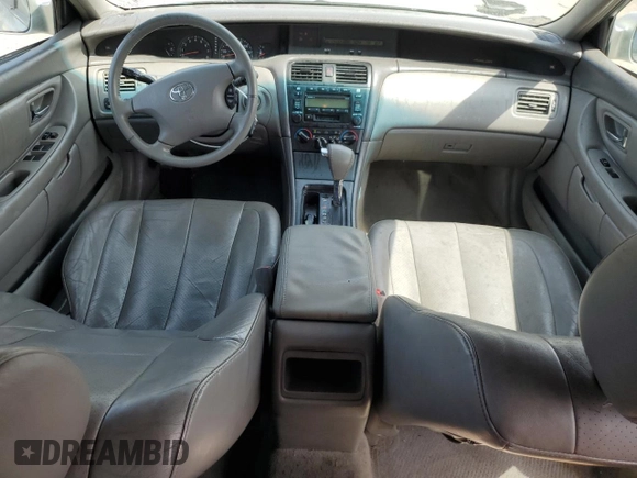 2004 Toyota Avalon XL z VIN 4T1BF28B14U377665, wystawiony jako Copart lot #55421495 z przebiegiem 174 323 mil mil oraz Szkoda całkowita • Salvage title. Historia ofert i sprzedaży dostępna na DreamBid. Obrazek 8.