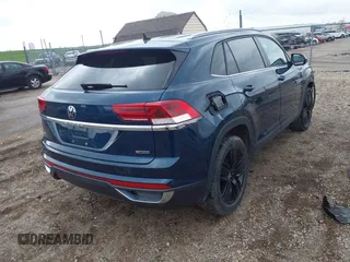 2021 Volkswagen Atlas SE with VIN 1V2LC2CA2MC228525, listed as a IAAI auction lot 42127917 with 74,707 mi miles and . Bid and sale history available at DreamBid. Image 4.