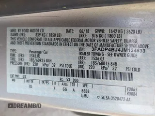 2018 Ford Fiesta SE with VIN 3FADP4BJ4JM134833, listed as a IAAI auction lot 41924079 with 76,781 mi miles and . Bid and sale history available at DreamBid. Image 9.
