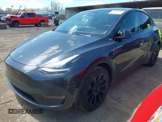 2024 Tesla Model Y Long Range with VIN 7SAYGAEE4RF078906, listed as a IAAI auction lot 42051207 with Not Provided miles and . Bid and sale history available at DreamBid. Image 18.