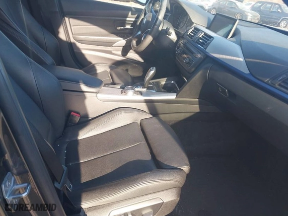 2014 BMW 3 Series 335i xDrive with VIN WBA3B9G54ENR91076, listed as a IAAI auction lot 41643651 with 55,558 mi miles. Bid and sale history available at carsss.com. Image 5.