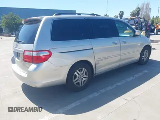 2006 Honda Odyssey EX-L with VIN 5FNRL38766B038599, listed as a IAAI auction lot 41989217 with 164,118 mi miles. Bid and sale history available at carsss.com. Image 4.