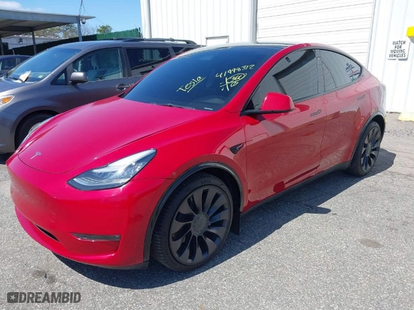 2023 Tesla Model Y Long Range with VIN 7SAYGDEE0PA094810, listed as a IAAI auction lot 41998312 with 10,376 mi miles. Bid and sale history available at carsss.com. Image 2.