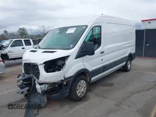 2021 Ford Transit Cargo with VIN 1FTBR1C85MKA12810, listed as a IAAI auction lot 41610132 with 105,724 mi miles and . Bid and sale history available at DreamBid. Image 17.