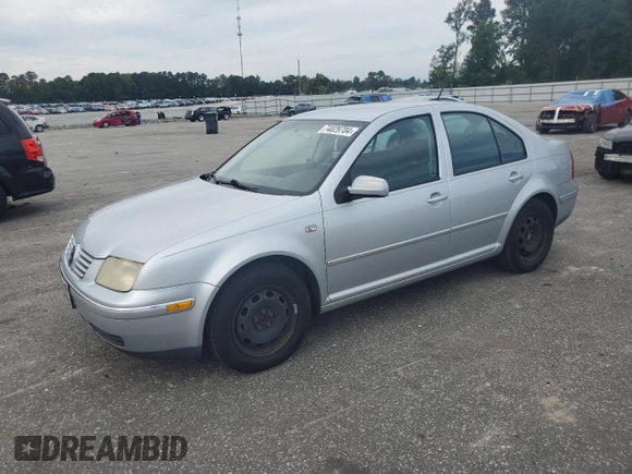 2004 Volkswagen Jetta GL with VIN 3VWRR69M34M108439, listed as a Copart auction lot 74029704 with 296,984 mi miles and Salvage title. Bid and sale history available at DreamBid. Image 1.