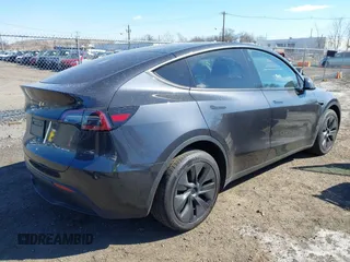 2024 Tesla Model Y Long Range with VIN 7SAYGDEE4RF149457, listed as a IAAI auction lot 41700922 with Not Provided miles. Bid and sale history available at carsss.com. Image 4.