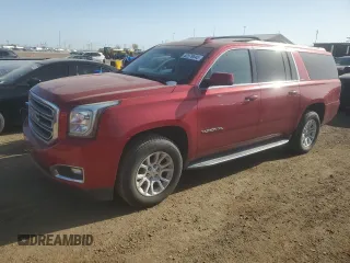 2015 GMC Yukon XL SLT z VIN 1GKS2HKC2FR659134, wystawiony jako Copart lot #52579545 z przebiegiem 119 639 mil mil oraz Czysty tytuł • Clean title. Historia ofert i sprzedaży dostępna na DreamBid. Obrazek 1.