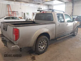 2010 Nissan Frontier SE with VIN 1N6AD0FV5AC439977, listed as a IAAI auction lot 41666404 with 152,004 mi miles and . Bid and sale history available at DreamBid. Image 4.