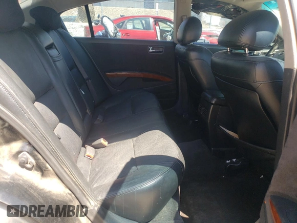 2005 Nissan Maxima SE z VIN 1N4BA41E45C805471, wystawiony jako Copart lot #58156355 z przebiegiem 184 521 mil mil oraz Szkoda całkowita • Salvage title. Historia ofert i sprzedaży dostępna na DreamBid. Obrazek 10.