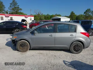 2012 Nissan Versa S with VIN 3N1BC1CP8CK242212, listed as a IAAI auction lot 42027327 with 117,118 mi miles. Bid and sale history available at carsss.com. Image 14.