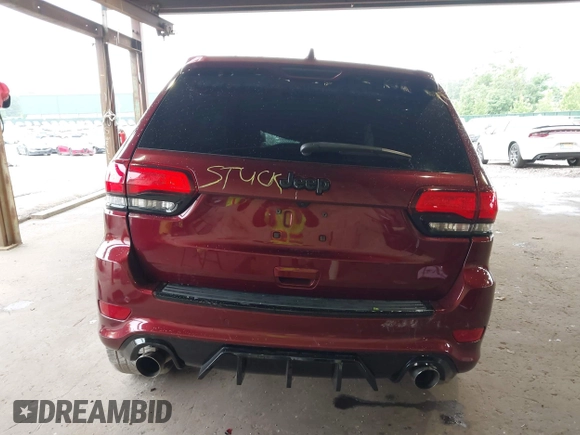 2018 Jeep Grand Cherokee SRT z VIN 1C4RJFDJ0JC231510, wystawiony jako IAAI lot #42445896 z przebiegiem 85 000 mil mil oraz . Historia ofert i sprzedaży dostępna na DreamBid. Obrazek 17.