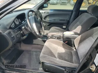 1999 Nissan Maxima GXE с VIN JN1CA21D8XT807286, выставлен на аукционе Copart как лот 57518235 с пробегом Не указан миль и Чистый • Clean title. История ставок и продаж доступна на DreamBid. Изображение 7.