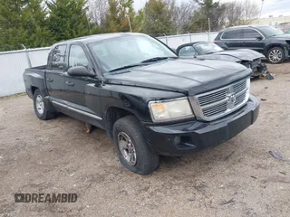 2008 Dodge Dakota Laramie with VIN 1D7HW58NX8S602604, listed as a IAAI auction lot 41717006 with 167,023 mi miles. Bid and sale history available at carsss.com. Image 1.