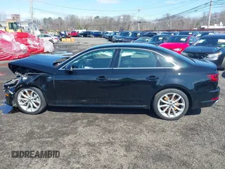2019 Audi A4 Premium z VIN WAUDNAF47KA107169, wystawiony jako IAAI lot #41891215 z przebiegiem 49 247 mil mil oraz . Historia ofert i sprzedaży dostępna na DreamBid. Obrazek 14.