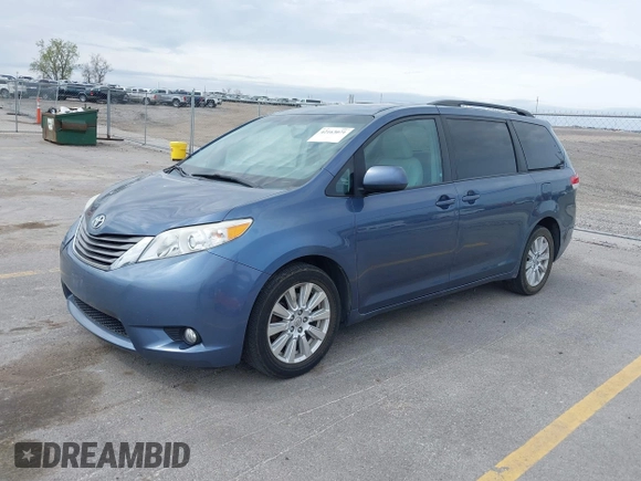 2014 Toyota Sienna Limited with VIN 5TDDK3DC5ES077601, listed as a IAAI auction lot 42163071 with 168,000 mi miles and . Bid and sale history available at DreamBid. Image 2.