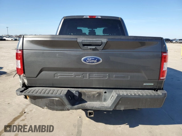 2020 Ford F-150 XL with VIN 1FTEW1CPXLKD42809, listed as a Copart auction lot 87208204 with 104,049 mi miles and Salvage Title. Bid and sale history available at carsss.com. Image 6.