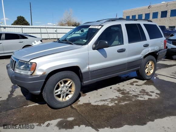2003 Jeep Grand Cherokee Laredo with VIN 1J4GW48S13C556129, listed as a Copart auction lot 50389215 with 193,934 mi miles and Salvage Title. Bid and sale history available at carsss.com. Image 1.