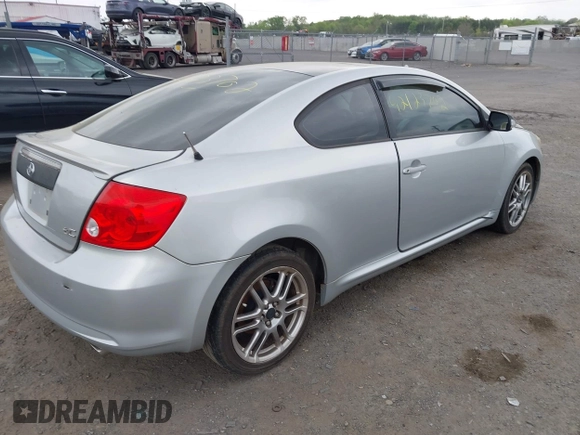 2005 Scion tC with VIN JTKDE177050032815, listed as a IAAI auction lot 42123702 with 228,973 mi miles. Bid and sale history available at carsss.com. Image 4.