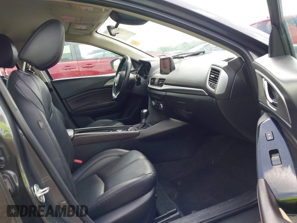 2018 Mazda 3 Touring z VIN 3MZBN1L35JM271525, wystawiony jako IAAI lot #42112552 z przebiegiem 107 299 mil mil oraz . Historia ofert i sprzedaży dostępna na DreamBid. Obrazek 5.