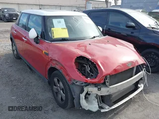 2015 MINI Hardtop 4 Door with VIN WMWXS5C59FT832549, listed as a IAAI auction lot 42106686 with 149,358 mi miles and . Bid and sale history available at DreamBid. Image 1.