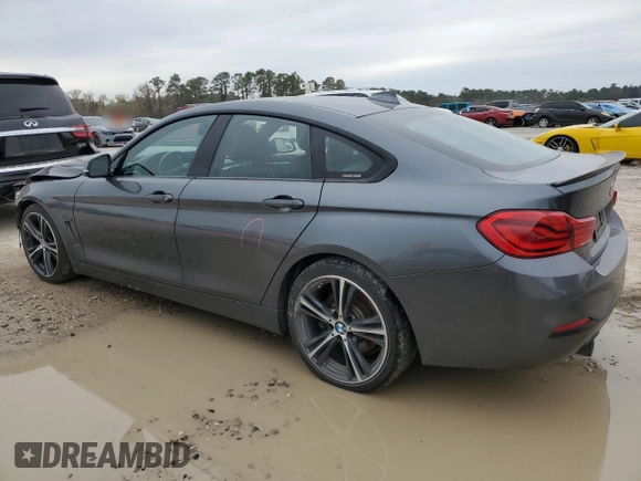 2018 BMW 4 Series 440i with VIN WBA4J5C53JBF07516, listed as a Copart auction lot 86118784 with 154,460 mi miles and Salvage Title. Bid and sale history available at DreamBid. Image 2.