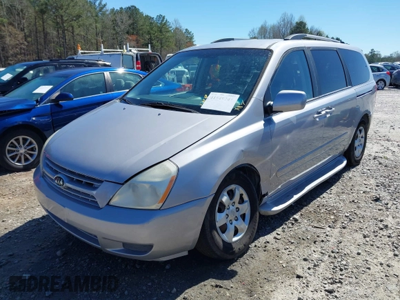 2009 Kia Sedona LX with VIN KNDMB233496315780, listed as a IAAI auction lot 41849241 with 174,224 mi miles. Bid and sale history available at carsss.com. Image 2.