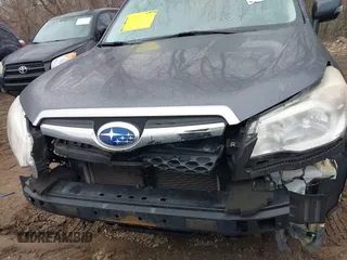 2014 Subaru Forester 2.5i Touring with VIN JF2SJAPC2EH552590, listed as a IAAI auction lot 41490583 with 84,538 mi miles. Bid and sale history available at carsss.com. Image 6.
