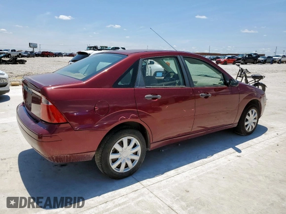 2007 Ford Focus S z VIN 1FAFP34NX7W324146, wystawiony jako Copart lot #59006755 z przebiegiem 160 398 mil mil oraz Szkoda całkowita • Salvage title. Historia ofert i sprzedaży dostępna na DreamBid. Obrazek 3.