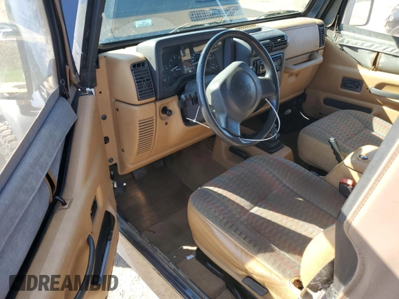 1997 Jeep Wrangler Sport with VIN 1J4FY19S0VP449796, listed as a Copart auction lot 74392904 with 139,322 mi miles and Clean Title. Bid and sale history available at carsss.com. Image 8.