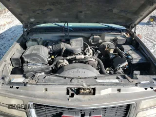 1999 GMC Yukon with VIN 1GKEK13R5XJ725991, listed as a Copart auction lot 71176784 with 245,481 mi miles and Clean Title. Bid and sale history available at carsss.com. Image 14.
