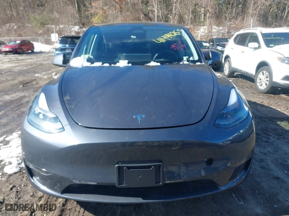 2023 Tesla Model Y Long Range with VIN 7SAYGAEE9PF905943, listed as a IAAI auction lot 41444255 with 11,179 mi miles. Bid and sale history available at carsss.com. Image 11.