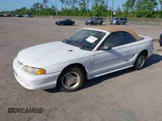 1995 Ford Mustang with VIN 1FALP4442SF243571, listed as a IAAI auction lot 42306376 with 227,445 mi miles and . Bid and sale history available at DreamBid. Image 2.
